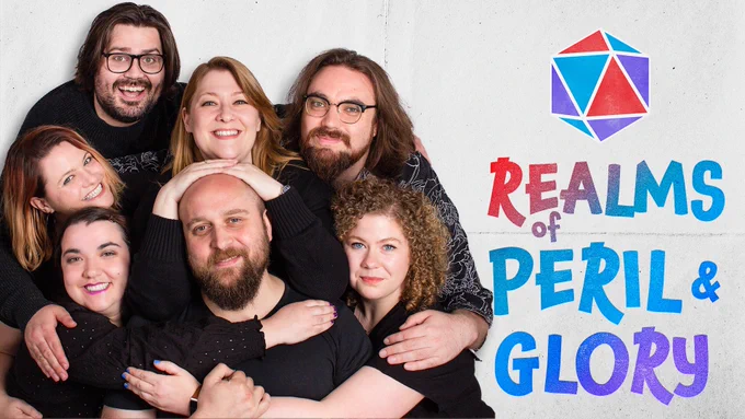 An image of the entire Realms cast hugging against a paper background with the show's title 'Realms of Peril & Glory' next to them and a purple, blue and red d20 in ink above the title.