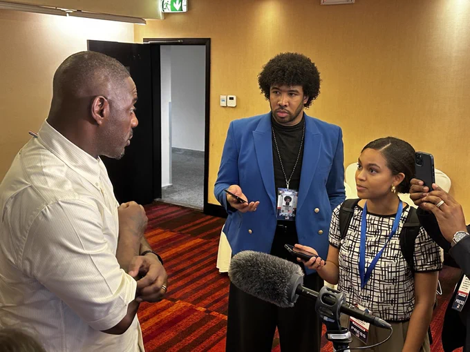 Akayla interviewing Idris Elba in Ghana with other reporters on the Vice President’s trip to Africa.
