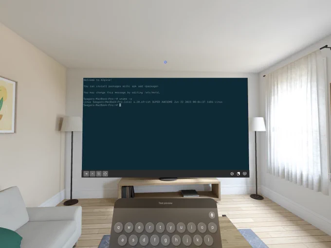 Screenshot of the Apple Vision Pro simulator in the living room scene, showing iSH in the Solarized Dark theme compiled natively for the visionOS (or should I say “xrOS”…or “XR Simulator”?) platform. The keyboard is up and the terminal screen shows the following text:

Welcome to Alpine!

You can install packages with: apk add <package>

You may change this message by editing /etc/motd.

Saagars-MacBook-Pro:~# uname -a
Linux Saagars-MacBook-Pro.local 4.20.69-ish SUPER AWESOME June 22 2023 00:04:37 i686 Linux
Saagars-MacBook-Pro:~#