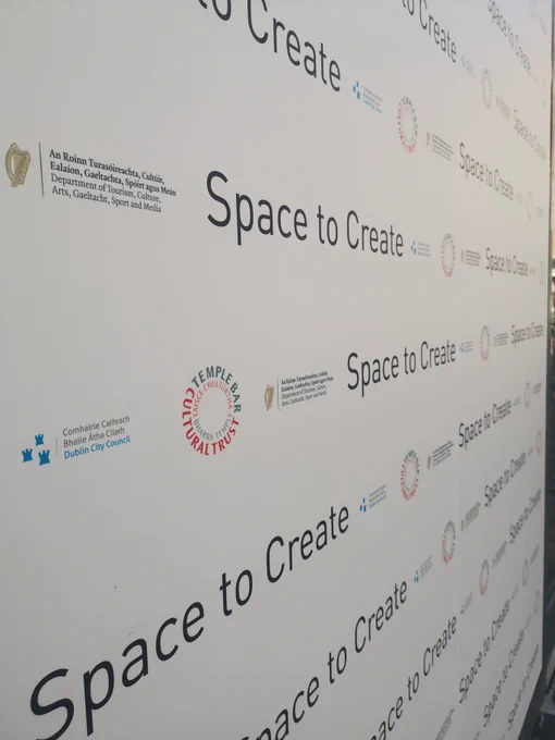 Wall with Space to Create written on it and logo's of organisations involved