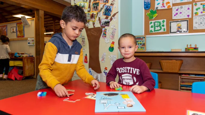 kinder students playing in class