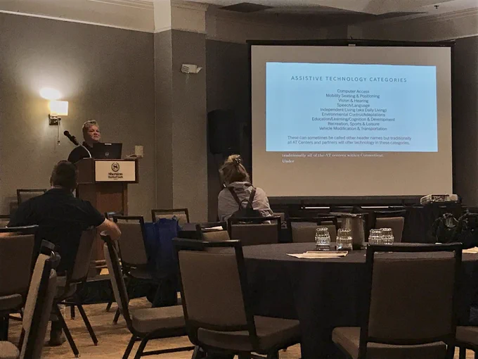 Shannon with slide on Assistive Technology Categories