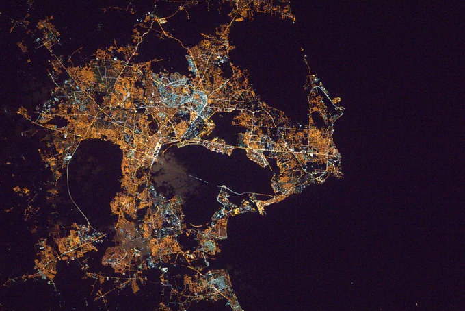 Captured from the International Space Station: Tunisia's capital shines brightly at night, showcasing an aerial cityscape illuminated by a tapestry of glowing lights.