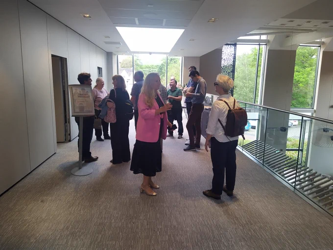 Participants at the CREES 60th anniversary event socialise before the event starts