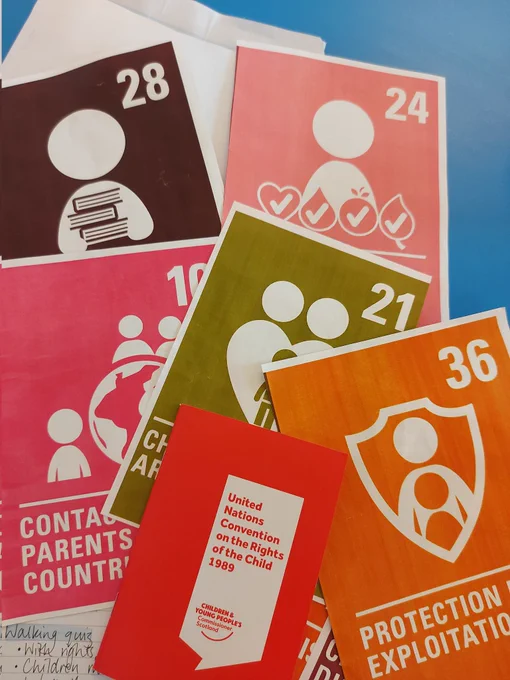 UNCRC article pictures in a pile
