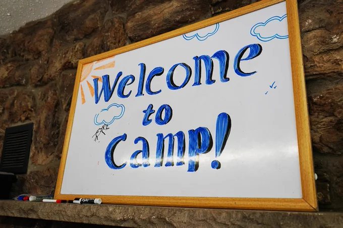 A sign welcomes campers to Camp Respite.