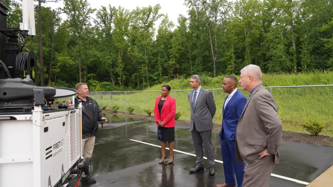 FirstNet employee demonstrates compact rapid deployable for FirstNet Authority Board members and North Carolina public safety leaders