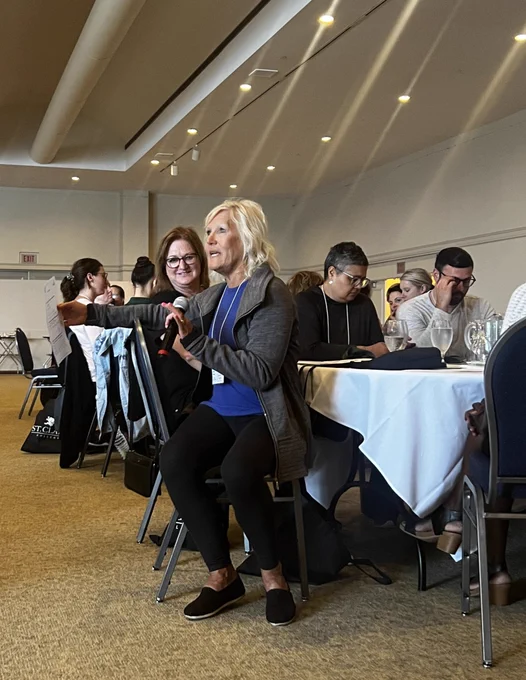 Educators attend a plenary session to reaffirm their passion for teaching.