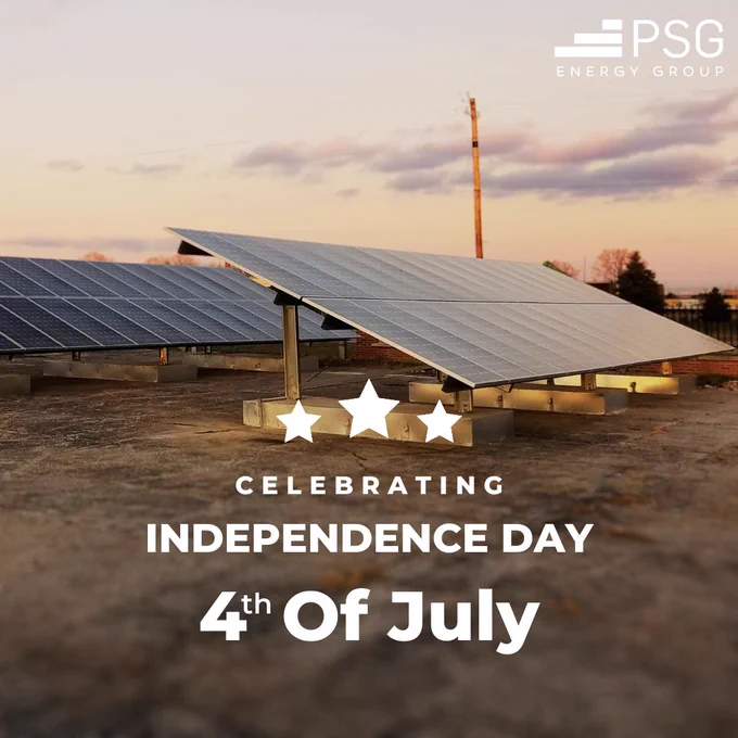 A photograph shows a solar array resting atop concrete ballasts in a hazy, afternoon sun. The PSG Energy Group logo appears in the top right, and text overlaying the image says "Celebrating Independence Day, 4th of July"