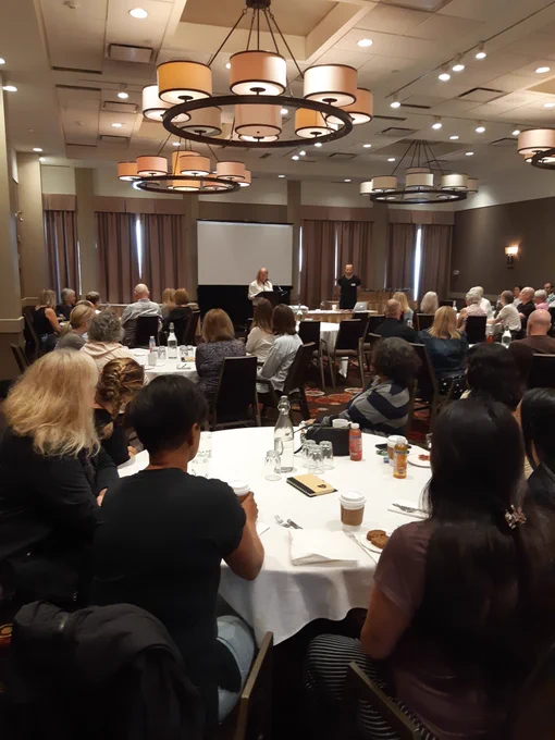 Sargeant Daniela Seravalli welcomes a room full of volunteers and their guests to the volunteer appreciation event.