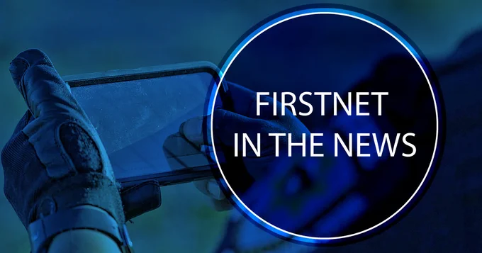 A public safety personnel holding a cell phone with gloves; "FirstNet in the News"