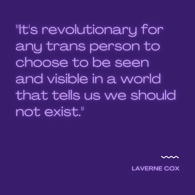 The image is a purple background with lighter purple neon text that features a quote from transgender actress Laverne Cox. The quote reads "It's revolutionary for any trans person to choose to be seen and visible in a world that tells us we should not exist.”