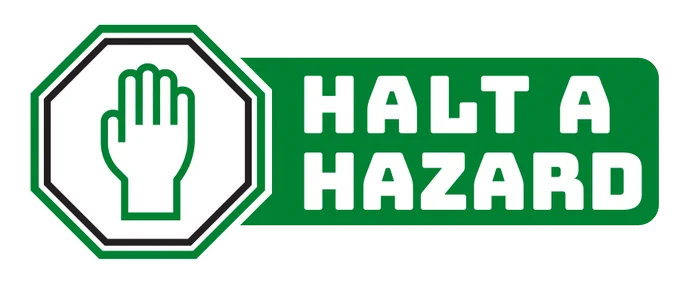 image says "Halt A Hazard" in white on a green background with a hand being held up to signal stop