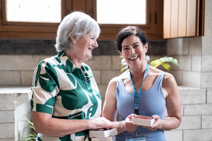 Sally Reynolds, COO of MLA, awarding Rosemary Smith (Trust Me Documentary) her 2023 MEDEA Finalist medal.