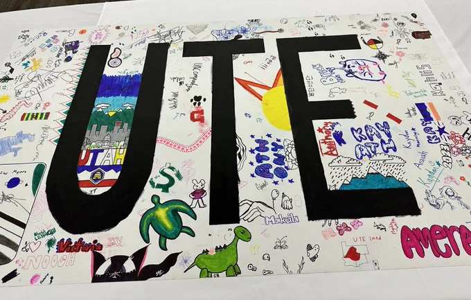A poster with "UTE" written in big letters with many drawings, words, and other illustrations surrounding. 
