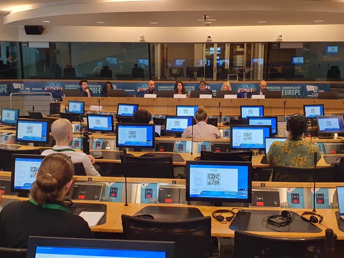 Panellists and public at Europcom 2023