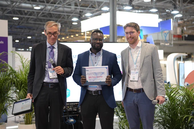 Milton Antwi receives his poster prize.