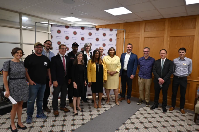 Hamilton County Board of County Commissioners are pictured with leaders from the Cincinnati Development Fund and awardees.