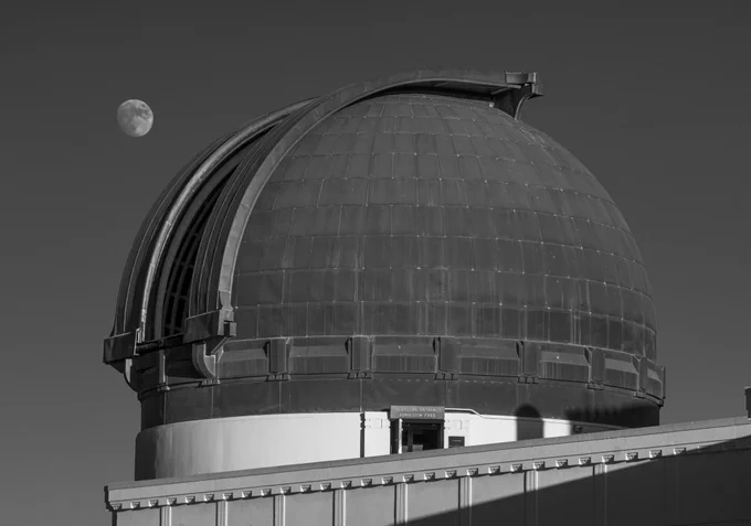 Moon rising over Griffith Observatory’s Zeiss telescope dome.