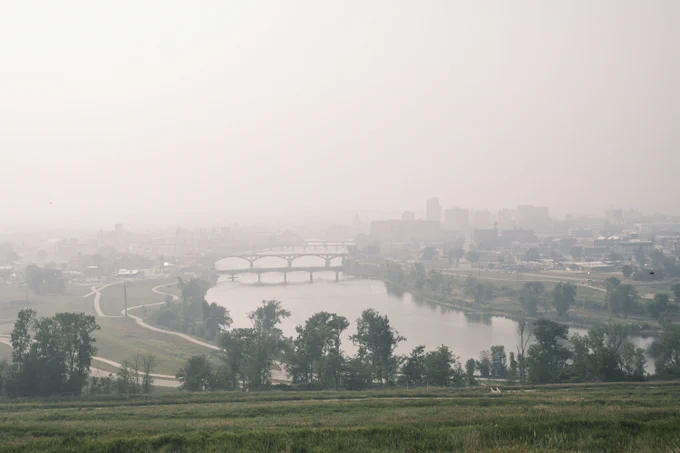  Haze obscures the skyline in Cedar Rapids, Iowa on Tuesday, June 27, 2023. Smoke from wildfires in Canada caused low air quality and obscured visibility. (Nick Rohlman/The Gazette)
