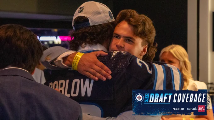 Colby Barlow and his family embrace at round one of the 2023 Upper Deck NHL Draft at Bridgestone Arena on June 28, 2023 in Nashville, Tennessee.