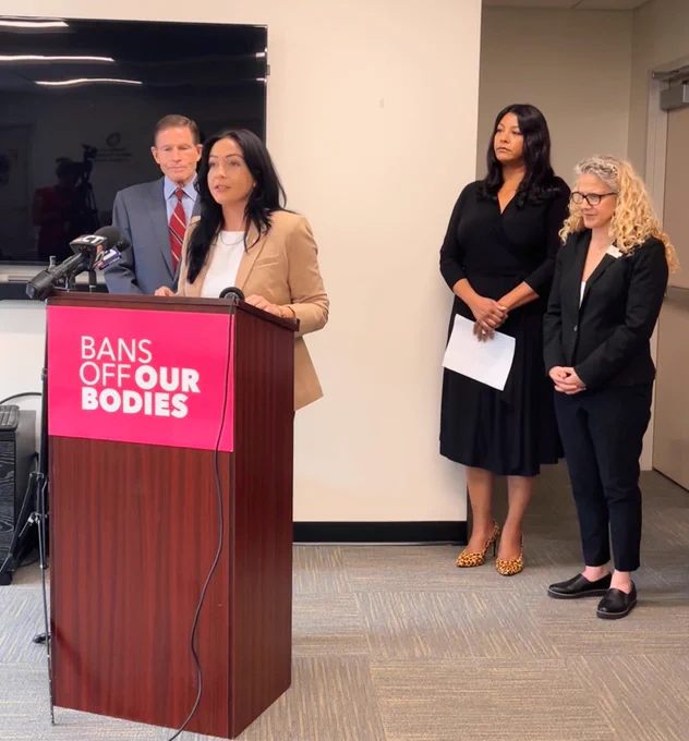 Liz Gustafson, State Director, PCCT speaking at the press conference