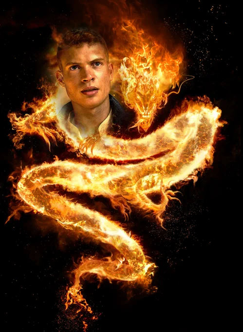 Concept art showing Josha Stradowski as Rand photoshopped onto an illustration of a large serpentine dragon made of fire coiling around him. The dragon’s head and claws are visible, formed entirely of glowing embers and fire. The background is dark, making the bright orange and gold flames stand out, creating a dramatic, mythic fantasy scene.