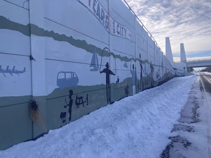 Mural on the side of a parking ramp in the winter 
