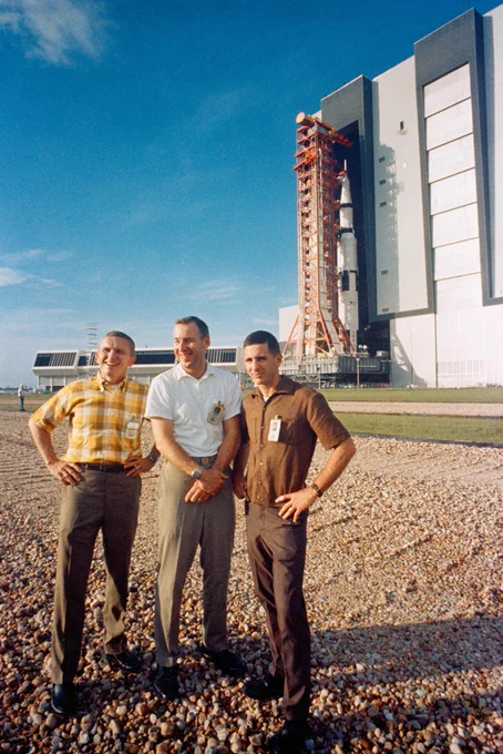 The crew of Apollo 8: poses in front of the Vehicle Assembly Building as their vehicle rolls out to the launch pad in October 1968.