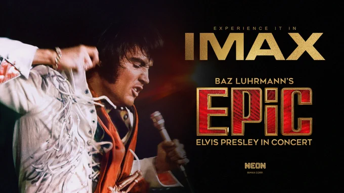 Elvis Presley energetically performing in a fringed jumpsuit, holding a microphone. Text: "Experience it in IMAX. Baz Luhrmann's Epic. Elvis Presley in Concert."