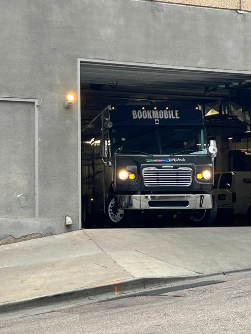 The new bookmobile pulls out of the garage at Penrose Library.