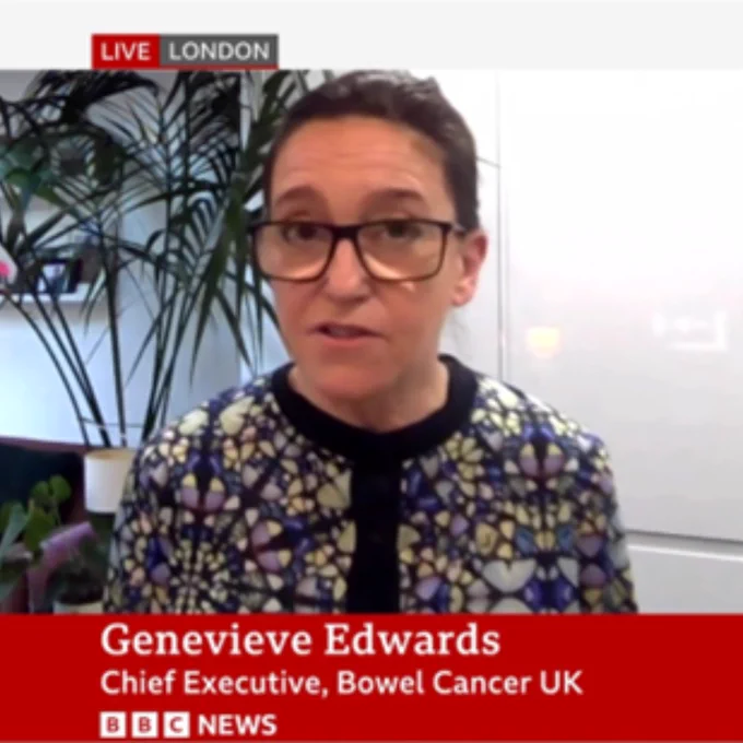 A screenshot of Bowel Cancer UK's Chief Executive, Genevieve Edwards, talking on BBC News about a new research project. 