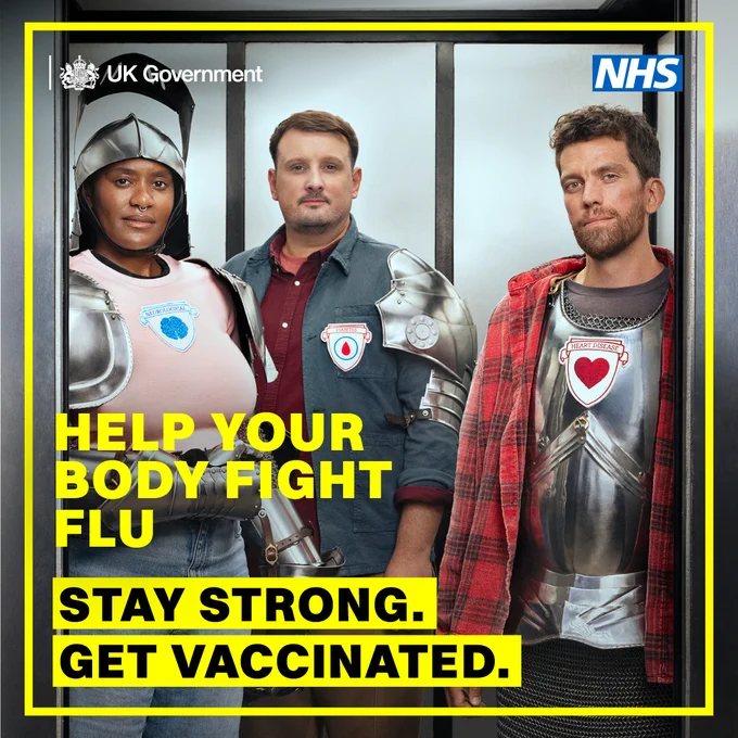 Group of people in armour with badges for heart, lungs, and blood conditions. Text reads: Help your body fight flu. Stay strong. Get vaccinated.