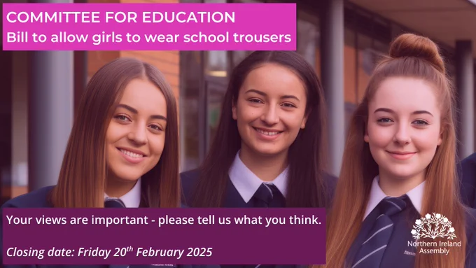 Image showing three teenage schoolgirls wearing navy uniforms and navy/white striped ties staring at the camera. In the background there is a school building made of brick and glass with metal beams. At the top of the image is the text 'Committee for Education: Bill to allow girls to wear school trousers' and below it reads 'Your views are important - please tell us what you think, closing date: Friday 20th February 2025.'