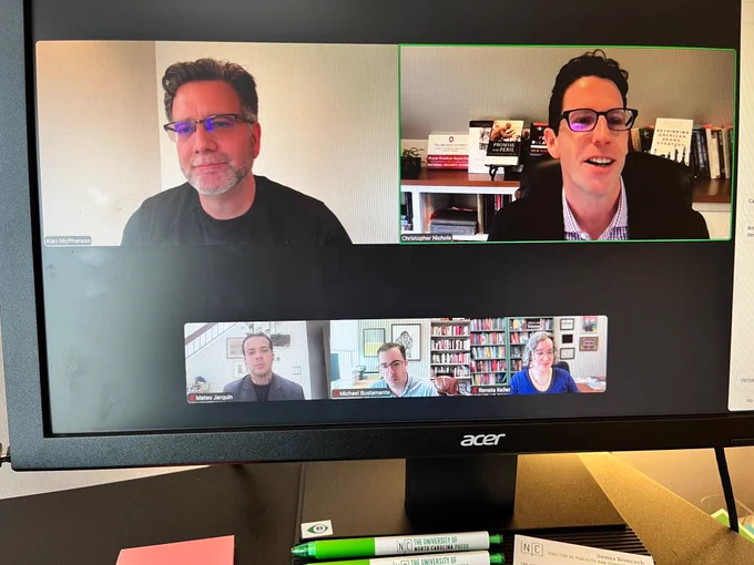 Zoom panel discussion with multiple scholars during a virtual event about US policy, Cuba, and Venezuela.
