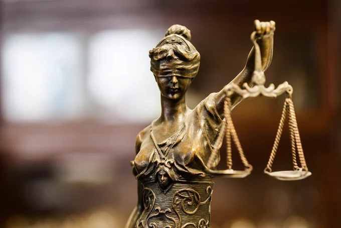 Photo of a statue of Lady Justice.  