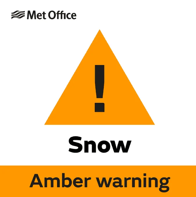 Amber triangle with exclamation mark. Snow warning from the Met office.
