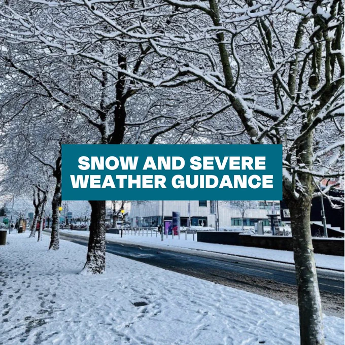 Winter scene showing a snowy street lined with trees, with a sign reading 'Snow and Severe Weather Guidance' displayed prominently.