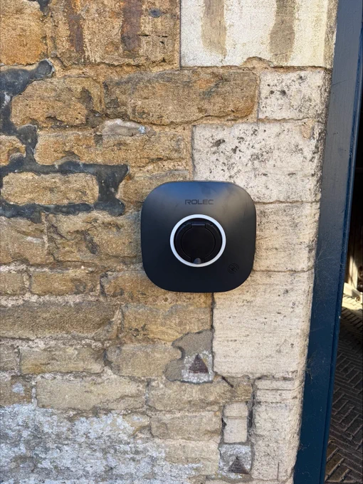 This installation features a Rolec three-phase EV charger, engineered to deliver high-capacity, reliable charging for commercial, fleet, and high-demand residential applications. Designed for durability and performance, the unit supports three-phase power supply, enabling significantly faster charging rates compared to single-phase alternatives. This makes it ideal for locations where reduced downtime, load balancing, and future scalability are key considerations.

The charger is housed in a robust, weather-resistant enclosure suitable for outdoor installation, ensuring long-term operation in exposed environments. Integrated safety features include overcurrent protection, earth fault monitoring, and compliance with current UK wiring regulations and EV charging standards. The compact wall-mounted design allows for a clean, unobtrusive installation while maintaining easy access for users and maintenance.

This particular system was installed by the Blandfords EV Team, specialists.