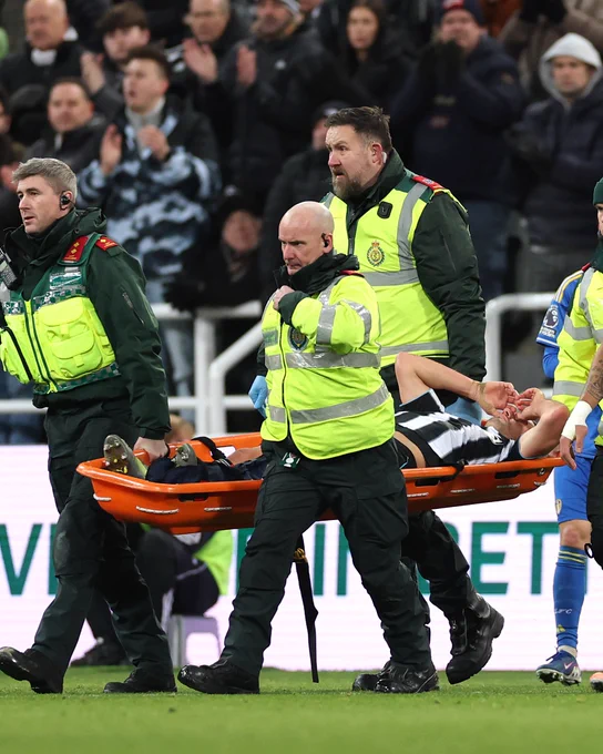 Fabian Schär being stretchered off after his injury. 