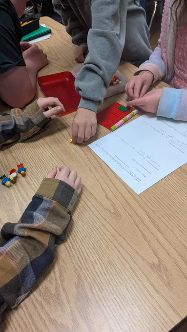 Students building with Legos 