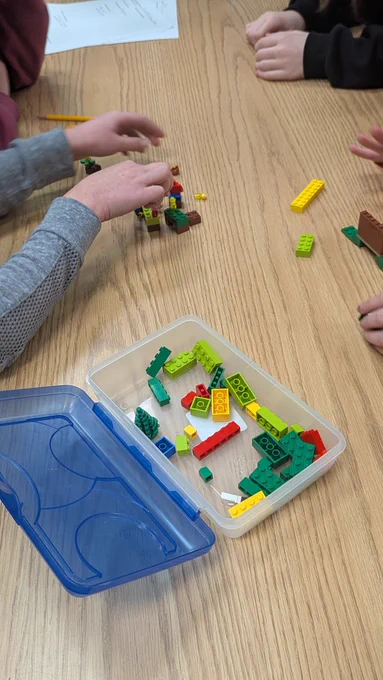 Students building with Legos 
