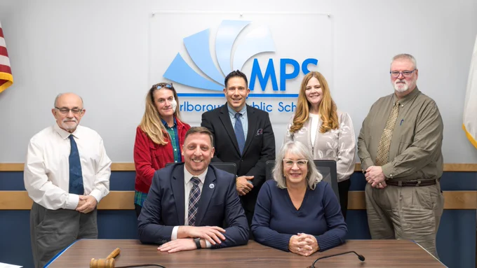 A group photo of the school committee members.