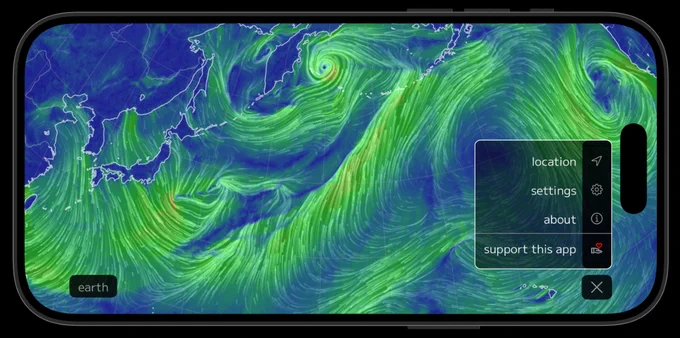 Screenshot of the Nullschool app in landscape orientation showing wind streams over the Northern Pacific Ocean with the action menu overlaid on top.
