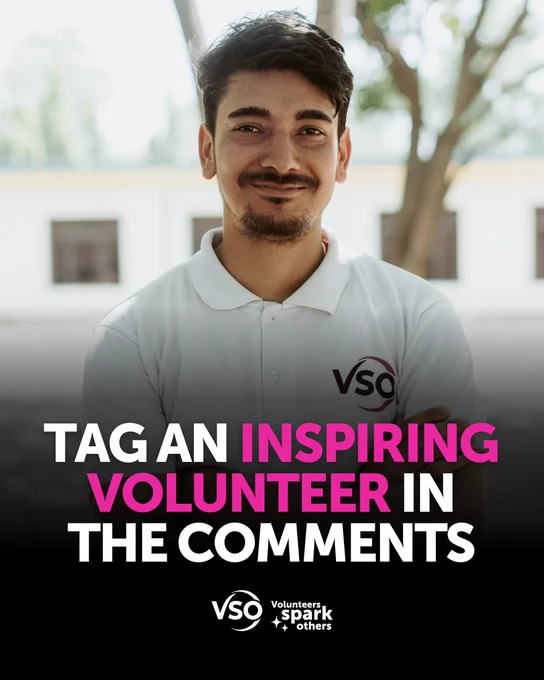 A volunteer in Nepal is smiling directly to the camera. He is wearing a white VSO t-shirt in an outdoors setting. Text appears on top of the image reading 'Tag an inspiring volunteer in the comments' - and below this, sits the VSO Volunteers Spark Others logo.
