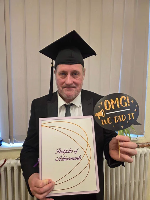 David with his certificate  