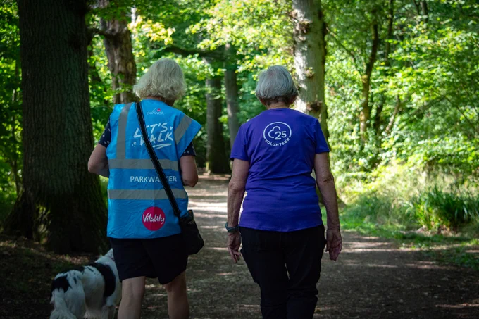 parkwalkers on a route through a forest