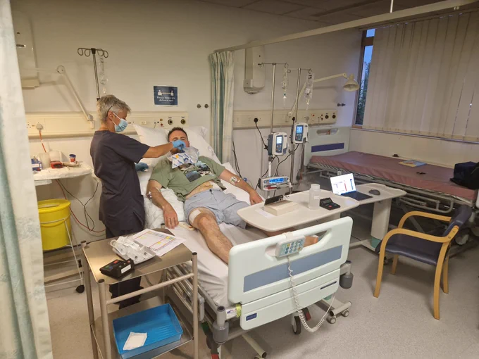 Trial participant Rowan Waller with a research nurse  