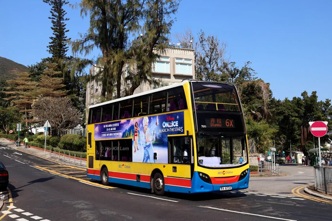 Citybus 7015 (RA 6734) is an Alexander Dennis Enviro400 in Citybus colours with a base yellow with a red and blue stripe towards the bottom of the bus. It is pictured in Stanley as it finishes its journey on route 6X. 