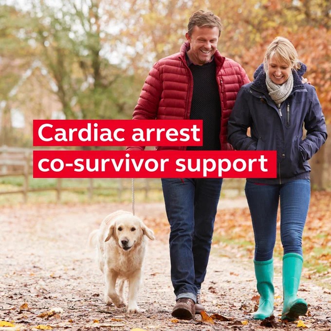 couple walking their dog on a leafy path with overlaid text reading "cardiac arrest co-survivor support"